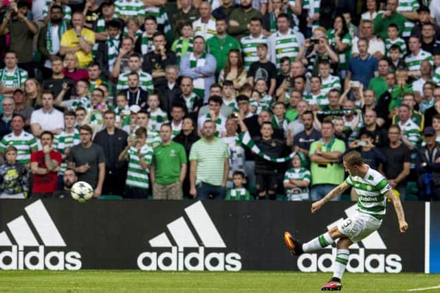 Leigh Griffiths fires in a free-kick to put Celtic 3-0 up. Picture: SNS