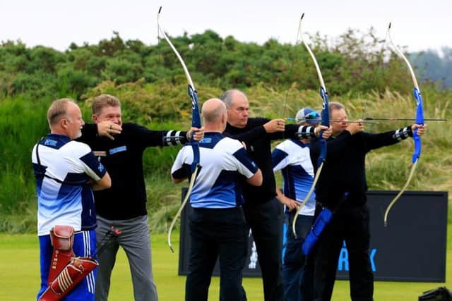 Paul Broadhurst, DJ Russell and Andrew Oldcorn get their eye in with a spot of archery at Archerfield ahead of the Prostate Cancer UK Scottish Senior Open. Picture: Phil Inglis