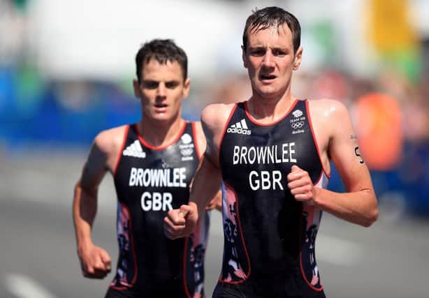 Great Britain's Alistair Brownlee leads from brother Jonny at the men's triathlon. Picture: Mike Egerton/PA Wire