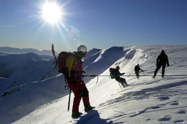 Mountain rescue volunteers near the summit of Aonoch Mor. Picture: Ian Rutherford/TSPL
