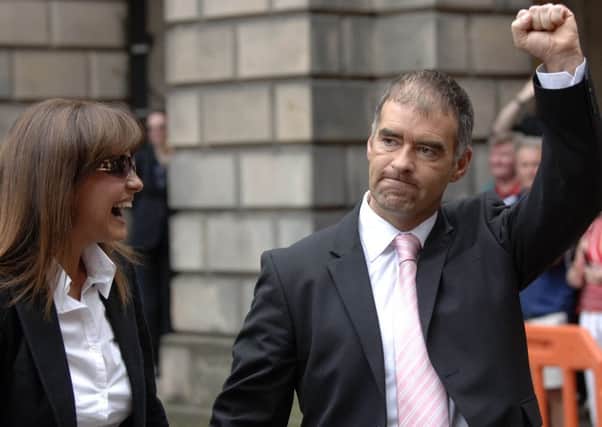 Tommy Sheridan celebrates with wife Gail after judges decide not to overturn his defamation victory at the Court of Session in Edinburgh. Picture: Ian Rutherford