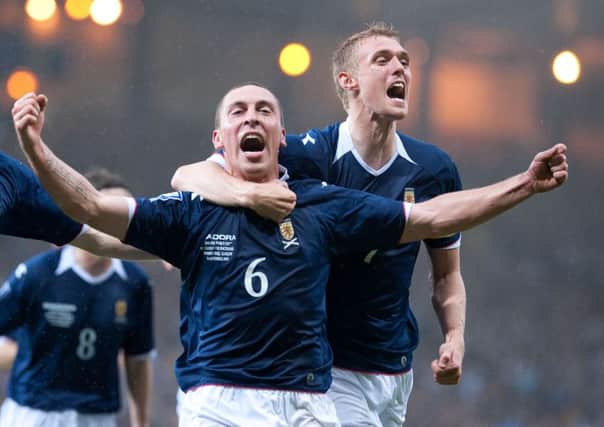 Will former captain Darren Fletcher, right, get the armband back from Scott Brown? Picture: SNS
