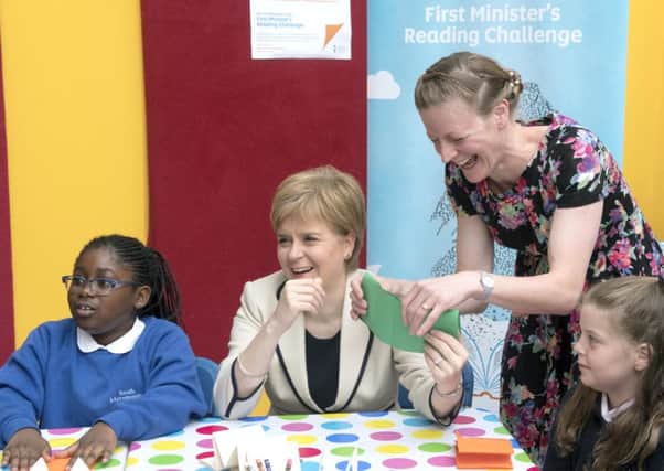 Nicola Sturgeon launches the Reading Challenge with children's author and illustrator Alice Melvin. Picture: PA