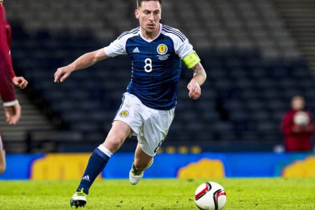 Scott Brown plays his last match for Scotland, in the friendly win over Denmark at Hampden in March. Photograph: SNS