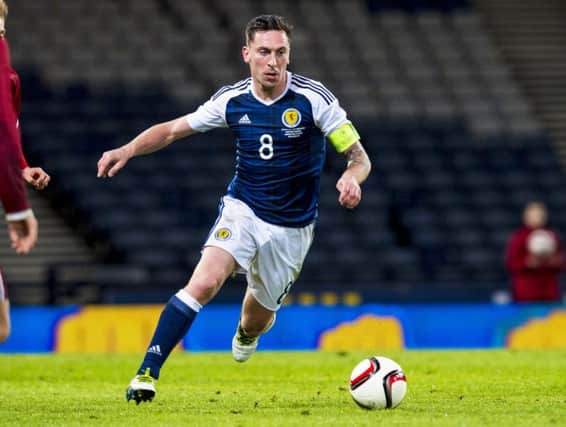 Scott Brown plays his last match for Scotland, in the friendly win over Denmark at Hampden in March. Photograph: SNS