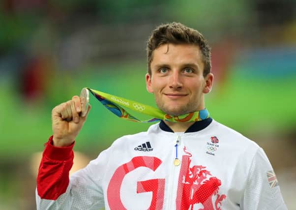 Scottish cyclist Callum Skinner poses with his silver medal in the Rio Olympic Velodrome. Picture: PA