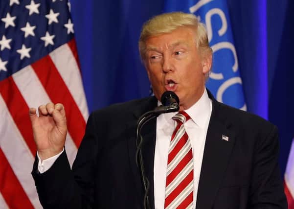 The ADLF claims that Donald Trump has broken the Ethics in Government Act. Photograph: AP