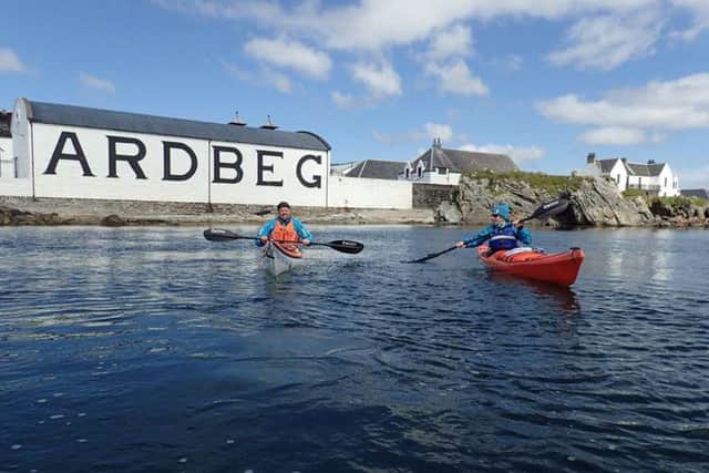 Kayakers enjoy the beautiful Islay coast, close to the Ardbeg distillery. Picture: Kayak Wild Islay
