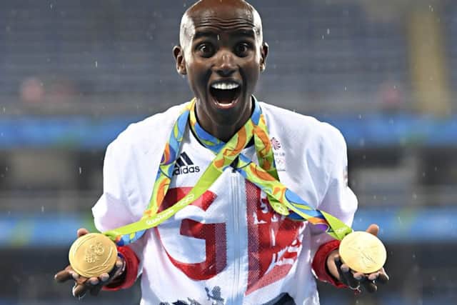 Mo Farah relishes the moment after winning the 5,000 metres race in Rio to win double gold at two successive Olympic Games. Picture: Getty