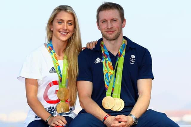 Medals galore: Cyclists Laura Trott and Jason Kenny. Picture: Bryn Lennon/Getty Images