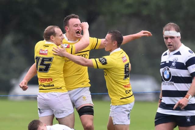 Melrose's Neil Irvine Hess celebrates the Borders side's second try. Picture: Gary Hutchison/SNS/SRU