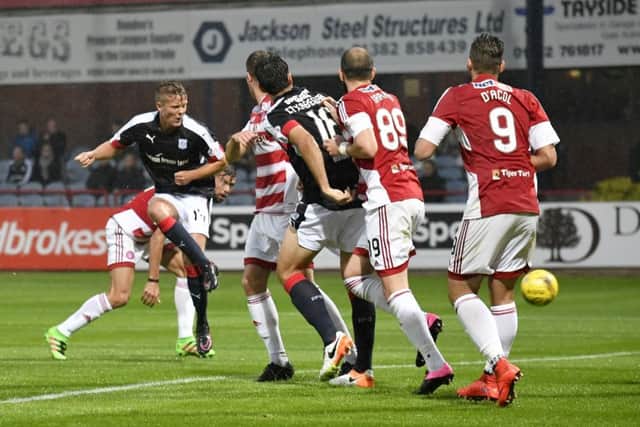 Mark O'Hara scores Dundee's equaliser four minutes after Hamilton had taken the lead. Picture: Rob Casey/SNS