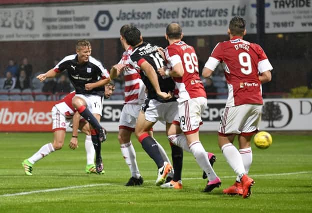 Mark O'Hara scores Dundee's equaliser four minutes after Hamilton had taken the lead. Picture: Rob Casey/SNS