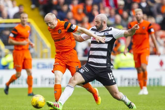Willo Flood, left, netted the third for United