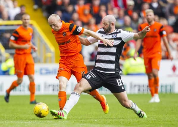 Willo Flood, left, netted the third for United