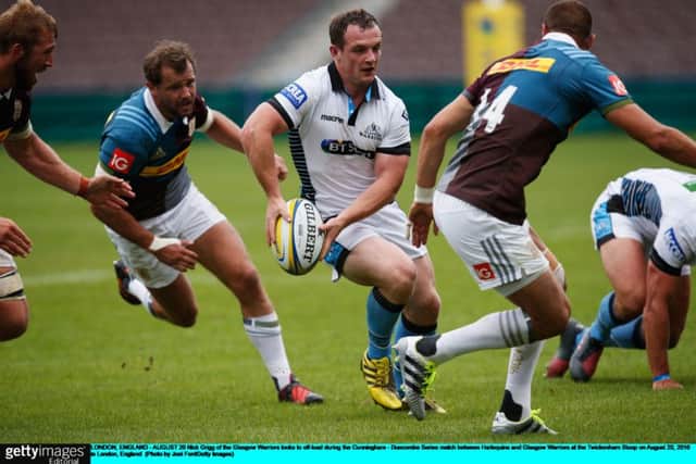 Nick Grigg of the Glasgow Warriors looks to off-load during their match against Harlequins. Picture: Joel Ford/Getty Images