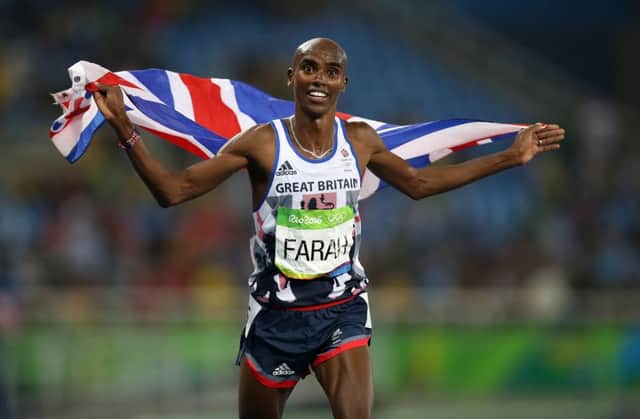 Great Britain's Mo Farah celebrates winning his historic fourth Olympic gold medal after the 5,000m. PICTURE: PA Wire
