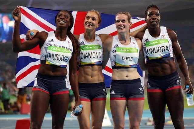 From left to right, Britains Christine Ohuruogu, Emily Diamond, Eilidh Doyle and Anyika Onuora celebrate bronze in the 4x400m relay. Picture: PA