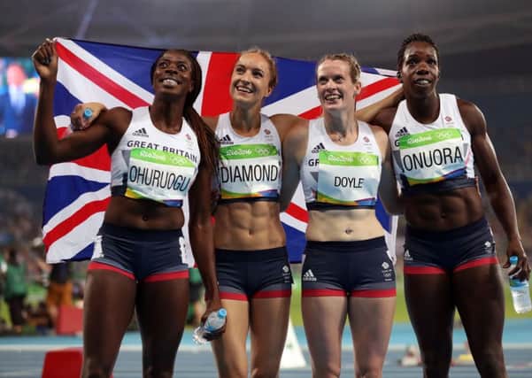 From left to right, Britains Christine Ohuruogu, Emily Diamond, Eilidh Doyle and Anyika Onuora celebrate bronze in the 4x400m relay. Picture: PA