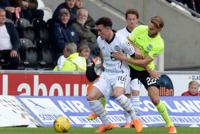 Hibs debutant Andrew Shinnie challenges Stephen Mallan of St Mirren during the Edinburgh clubs 2-0 victory in Paisley. Picture: SNS