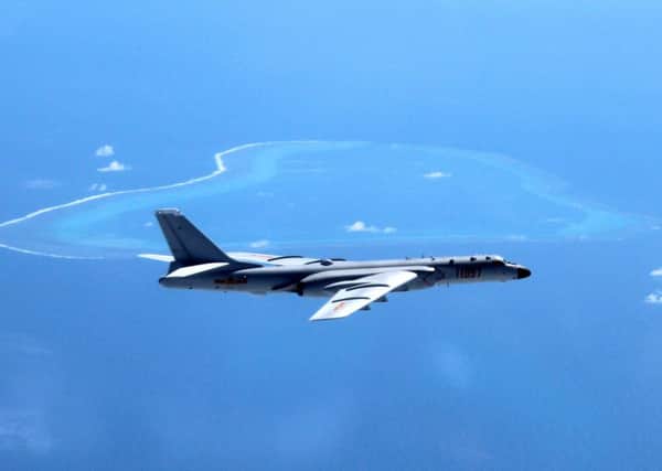 China has grown increasingly assertive over its claim to a chain of uninhabited islands controlled by Japan. Picture: AP