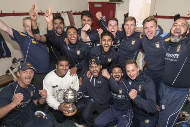 The victorious Clydesdale players celebrate in the dressing room after defeating Arbroath to lift the Scottish Cup at Hamilton Crescent. Picture: Donald MacLeod