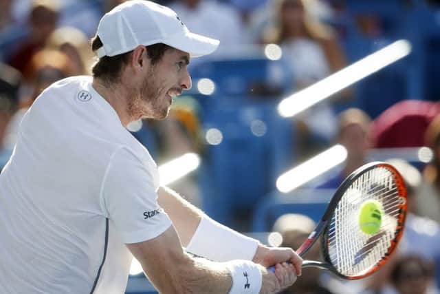 Andy Murray returns to Marin Cilic during Sundays Western & Southern Open final in Cincinnati. Picture: AP.