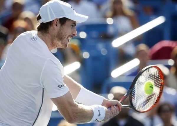 Andy Murray returns to Marin Cilic during Sundays Western & Southern Open final in Cincinnati. Picture: AP.