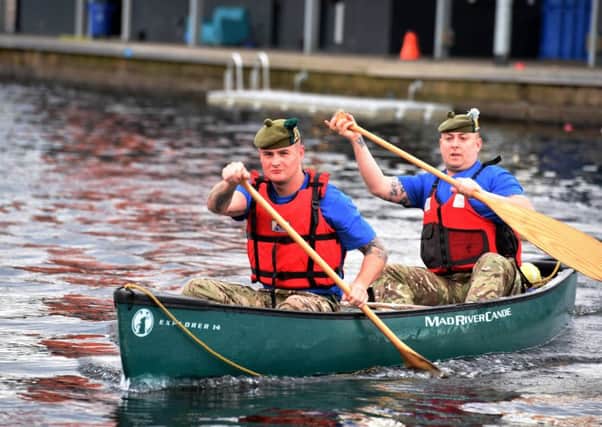Private Ryan OMalley and Colour Sergeant Jim Gould of the Royal Regiment of Scotland prepare at Glasgows Pinkston complex. Picture: AP