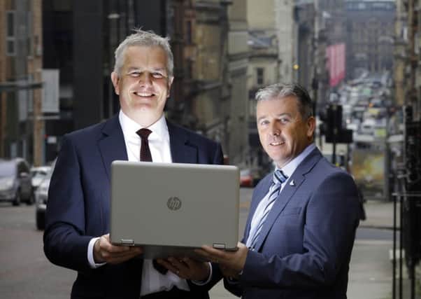 James McClafferty, business development director for Scotland at CityFibre, left, with HighNet boss David Siegel. Picture: Iain McLean