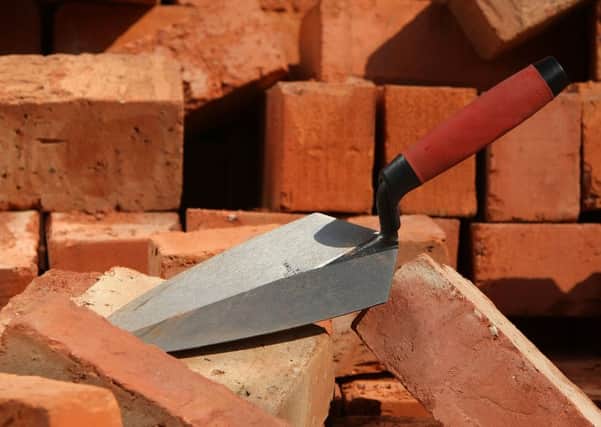 Scape Group said there was a shortage of skilled workers such as bricklayers. Picture: Christopher Furlong/Getty Images