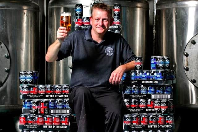 Harviestoun head brewer Stuart Cail raises a glass to the new cans. Picture: Contributed