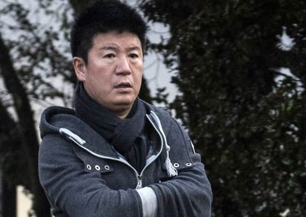 William Yan who fled to New Zealand after being accused of embezzling money in China. Picture: AP