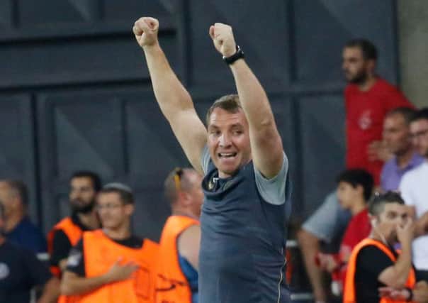 Brendan Rodgers celebrates as the full-time whistle goes. Picture: AFP/Getty