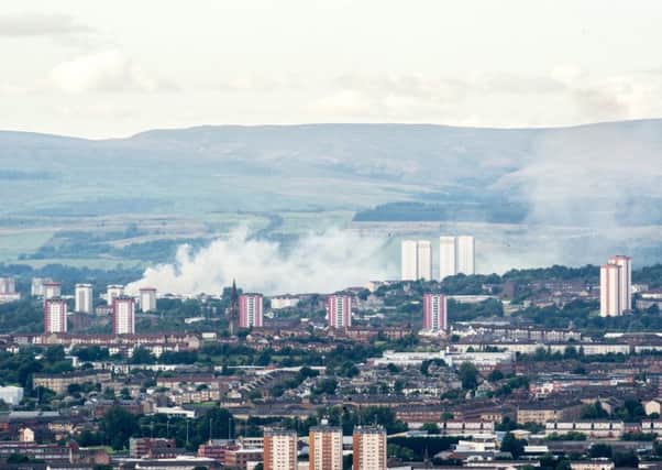 Smoke billowing across Glasgow from the blaze in the Milton area of the city. Picture: John Devlin