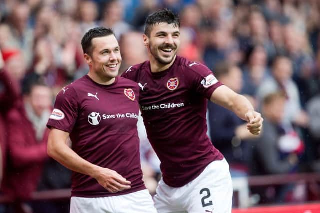 Hearts' Callum Paterson, right, is out of contract at the end of the season. Picture: Graham Stuart/SNS