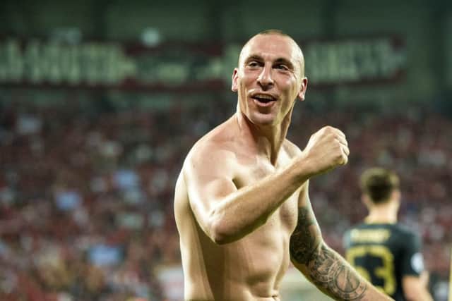 Celtic captain Scott Brown was handed a note by substitute Erik Sviatchenko. Picture: Craig Williamson/SNS