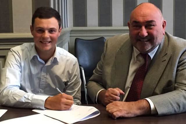 Jack McDonald, pictured with his manager Chubby Chandler, hasn't played for three months due to a wrist injury