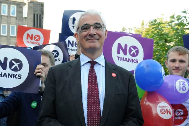 Alistair Darling pictured with Better Together campaigners in Stockbridge, Edinburgh, in September 2014. Picture: Lisa Ferguson