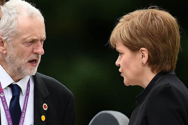 Labour leader Jeremy Corbyn, left, chats with Scotland's First Minister Nicola Sturgeon in June. Picture: Getty Images