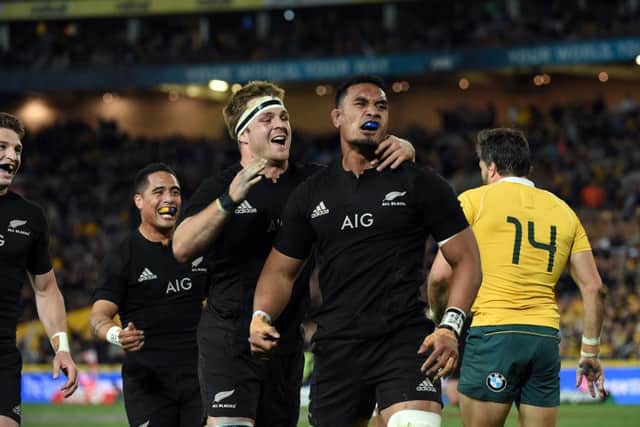 New Zealand players celebrate a 42-8 rout of Australia that proved theyre coping fine without Carter and McCaw. Picture: AFP/Getty