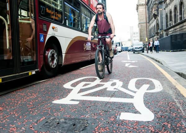 As well as cycle lanes, new laws are needed. Picture: Ian Georgeson