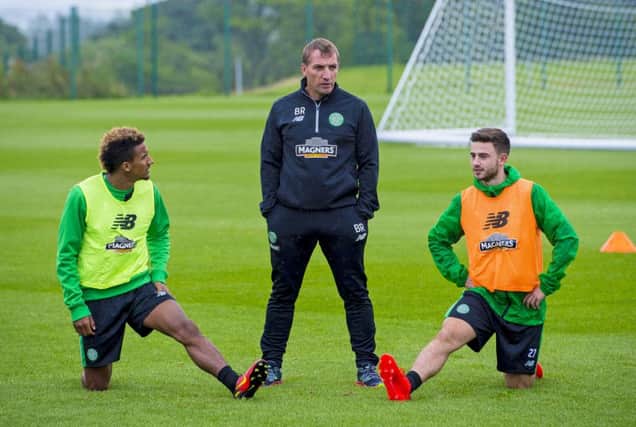 Celtic manager Brendan Rodgers with Scott Sinclair, left, and Patrick Roberts. Picture: Bill Murray/SNS