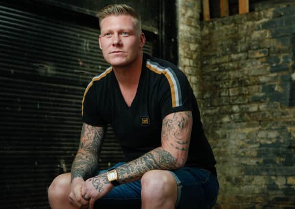 The tattoos tell the story of Garry O'Connor's life. Picture Toby Williams