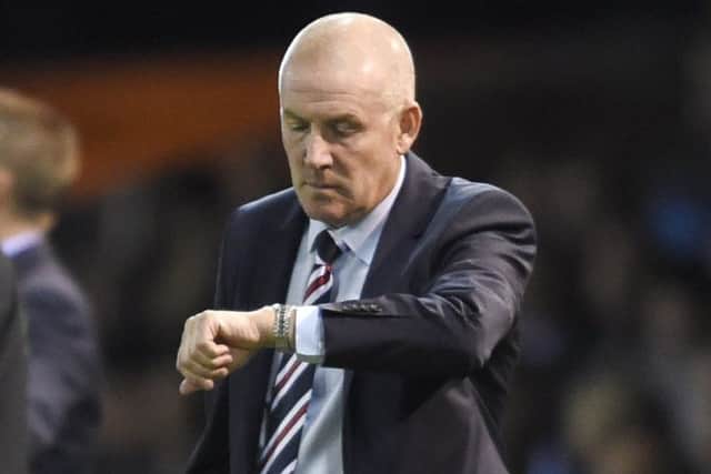 Rangers manager Mark Warburton looks at his watch at Rugby Park. Picture: Ian Rutherford/PA Wire