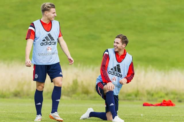 Hibs' Jason Cummings and Hearts' Sam Nicholson will line up together this week for Scotland Under-21s. Picture: Roddy Scott/SNS