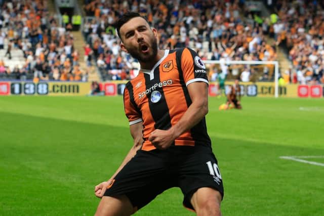 Scotland midfielder Robert Snodgrass celebrates scoring for Hull City
