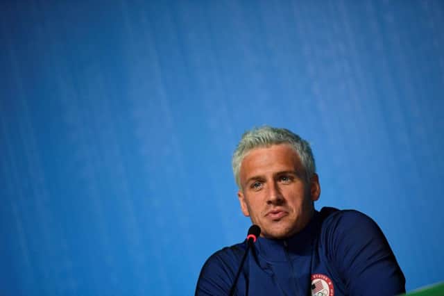 The unravelling of Ryan Lochtes claim that he had been robbed played out on social media. Picture: AFP/Getty