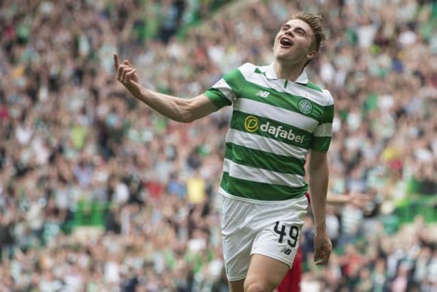 James Forrest celebrates putting Celtic 2-1 in front. Picture: SNS