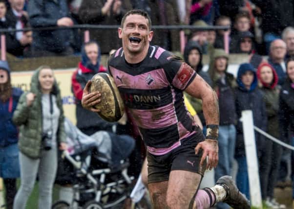 Ross Curle powered over for the first of Ayr's eight tries